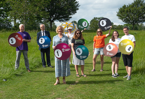 Mole Valley Community Lottery Good Causes Holding Lottery Balls